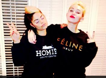 miley cyrus feline sweater faux logo